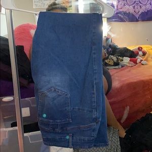 Ripped blue jeans. Butt lift
